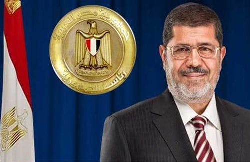 Cover Image for الانقلاب العسكري يقضي بسجن الرئيس الشرعي محمد مرسي 20 عاما سجنا